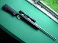 Bench rifle with Shepherd scope  